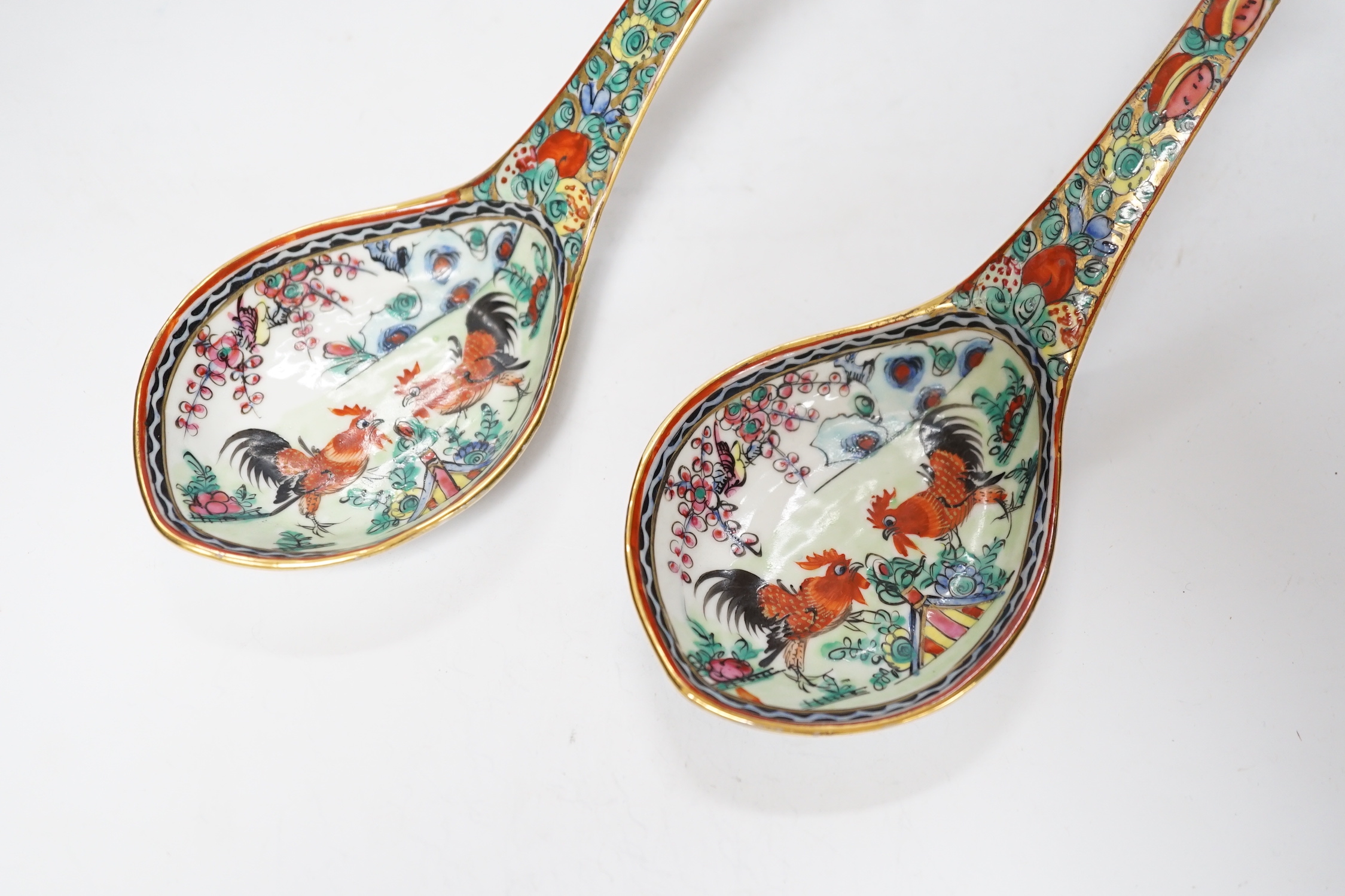 A pair of mid 20th century Chinese enamelled porcelain spoons, 21cm